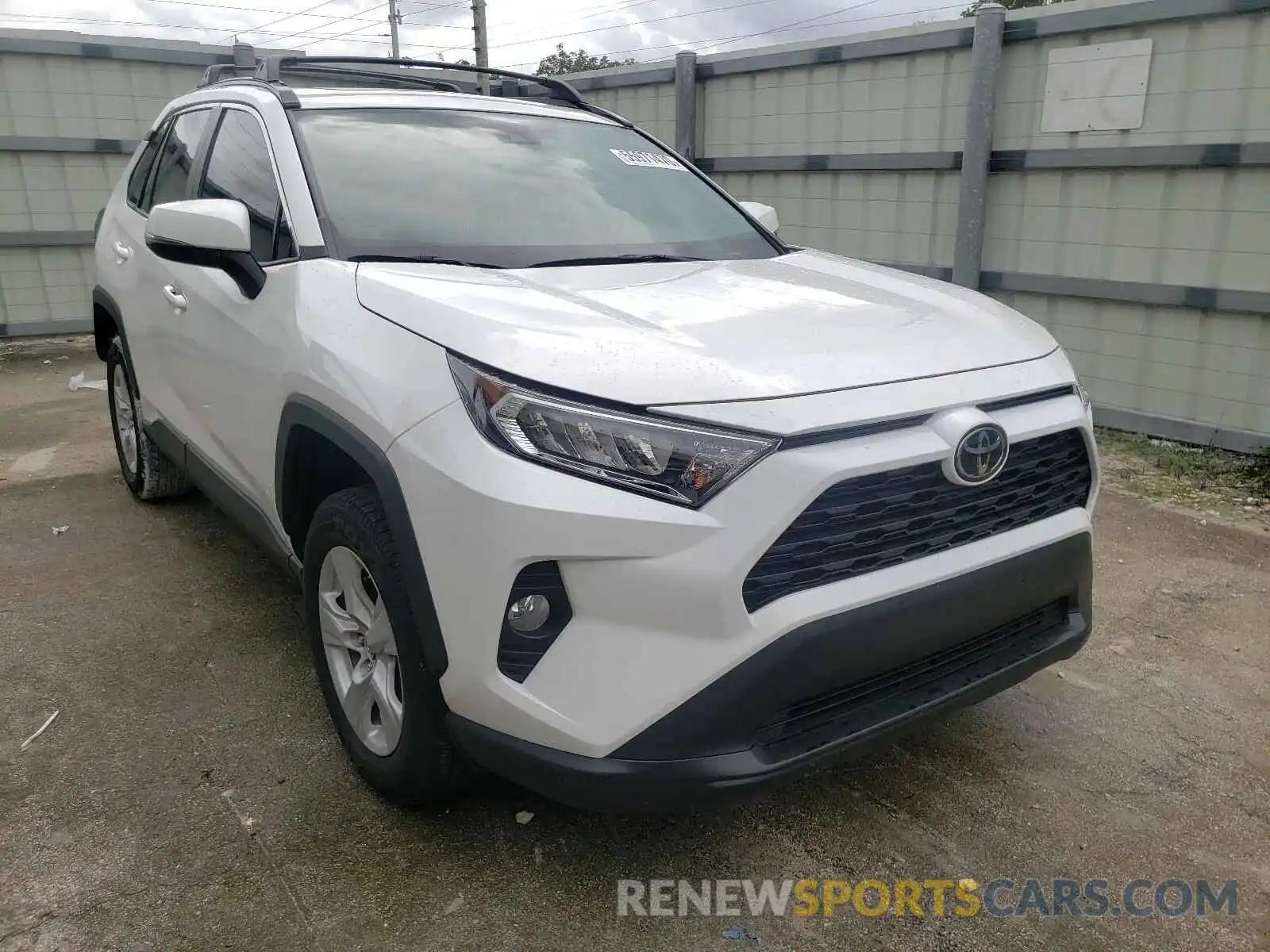 1 Photograph of a damaged car 2T3W1RFV0KC025379 TOYOTA RAV4 2019