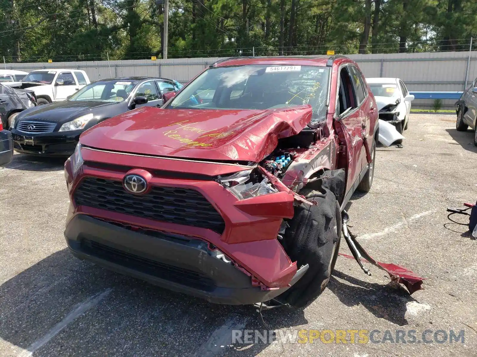 2 Photograph of a damaged car 2T3W1RFV0KC025575 TOYOTA RAV4 2019