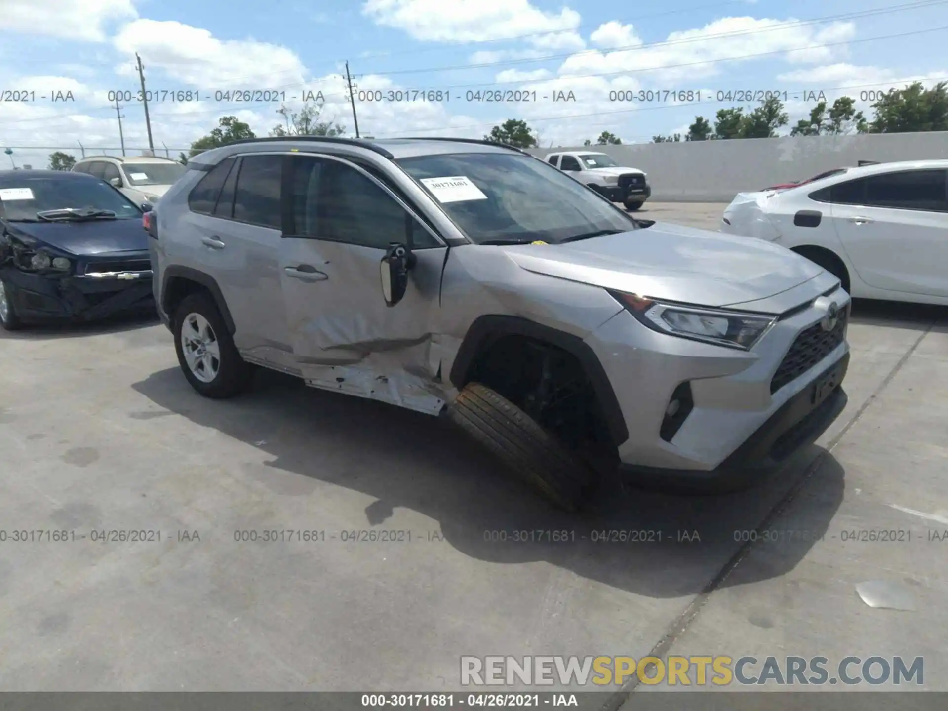 1 Photograph of a damaged car 2T3W1RFV0KC032106 TOYOTA RAV4 2019