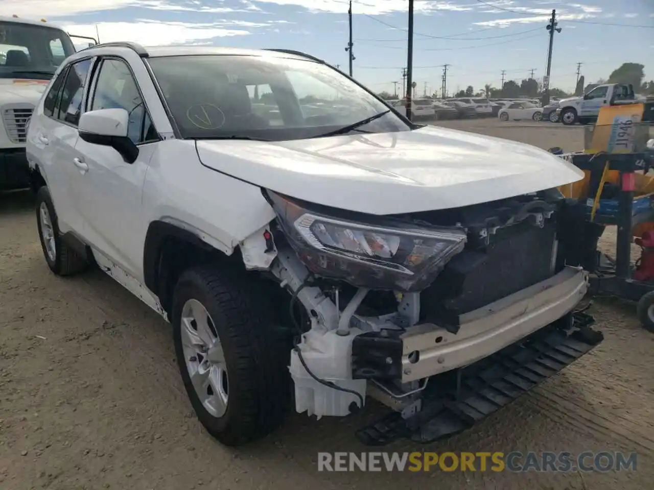 1 Photograph of a damaged car 2T3W1RFV0KW011335 TOYOTA RAV4 2019