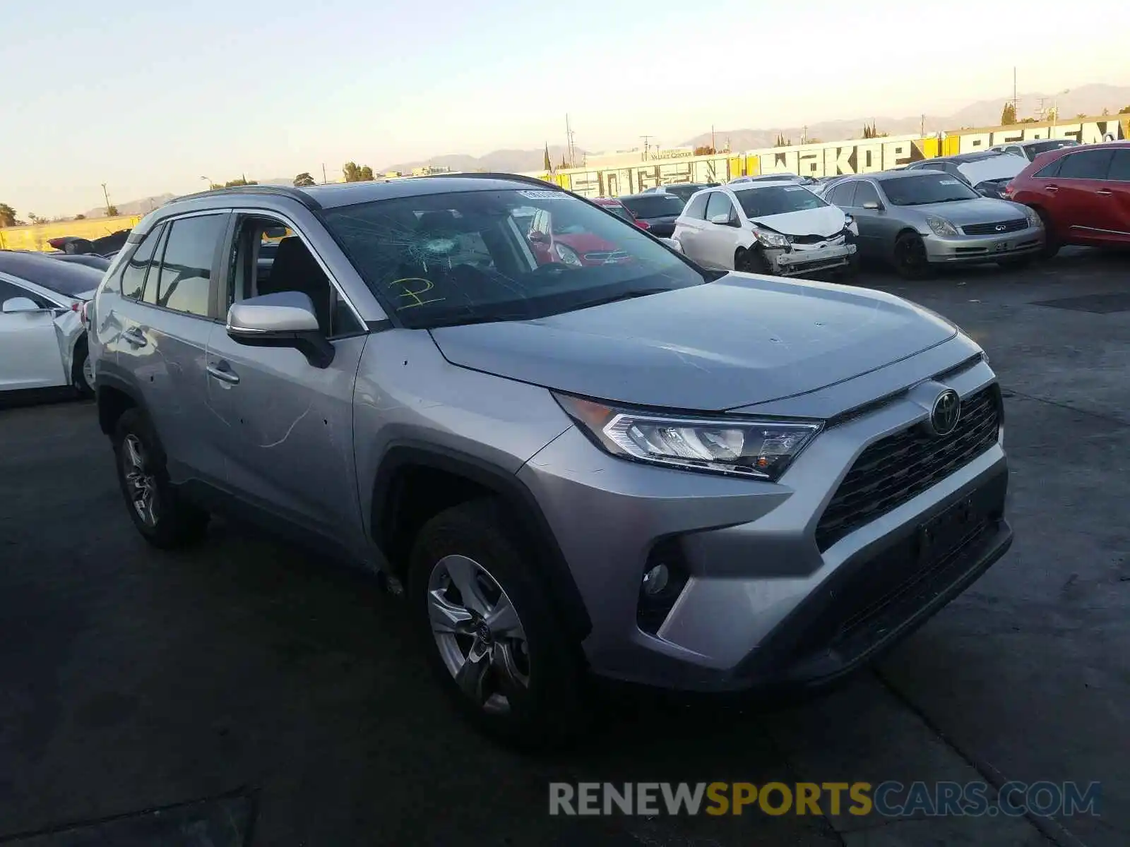 1 Photograph of a damaged car 2T3W1RFV0KW013425 TOYOTA RAV4 2019