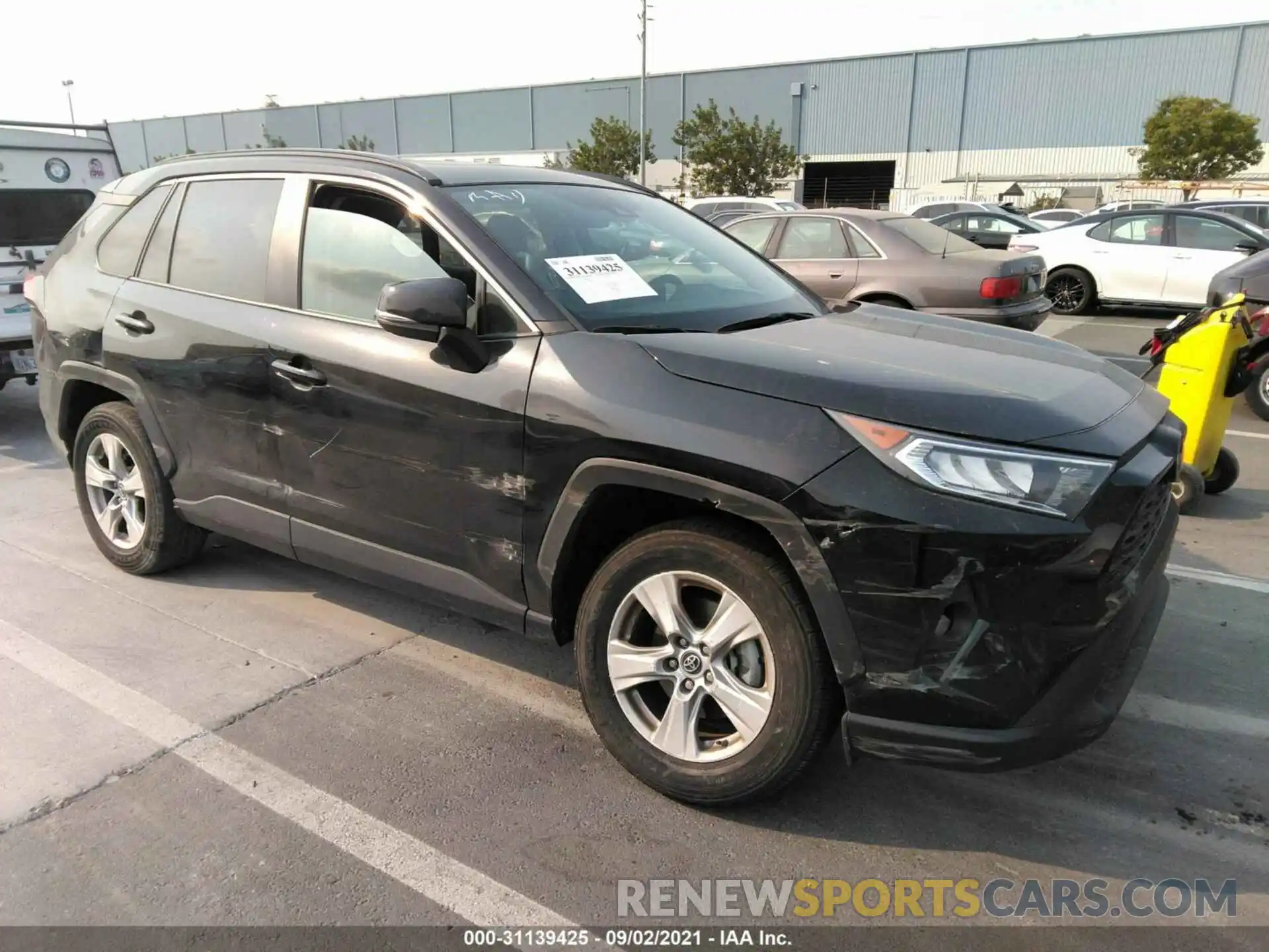 1 Photograph of a damaged car 2T3W1RFV0KW013697 TOYOTA RAV4 2019