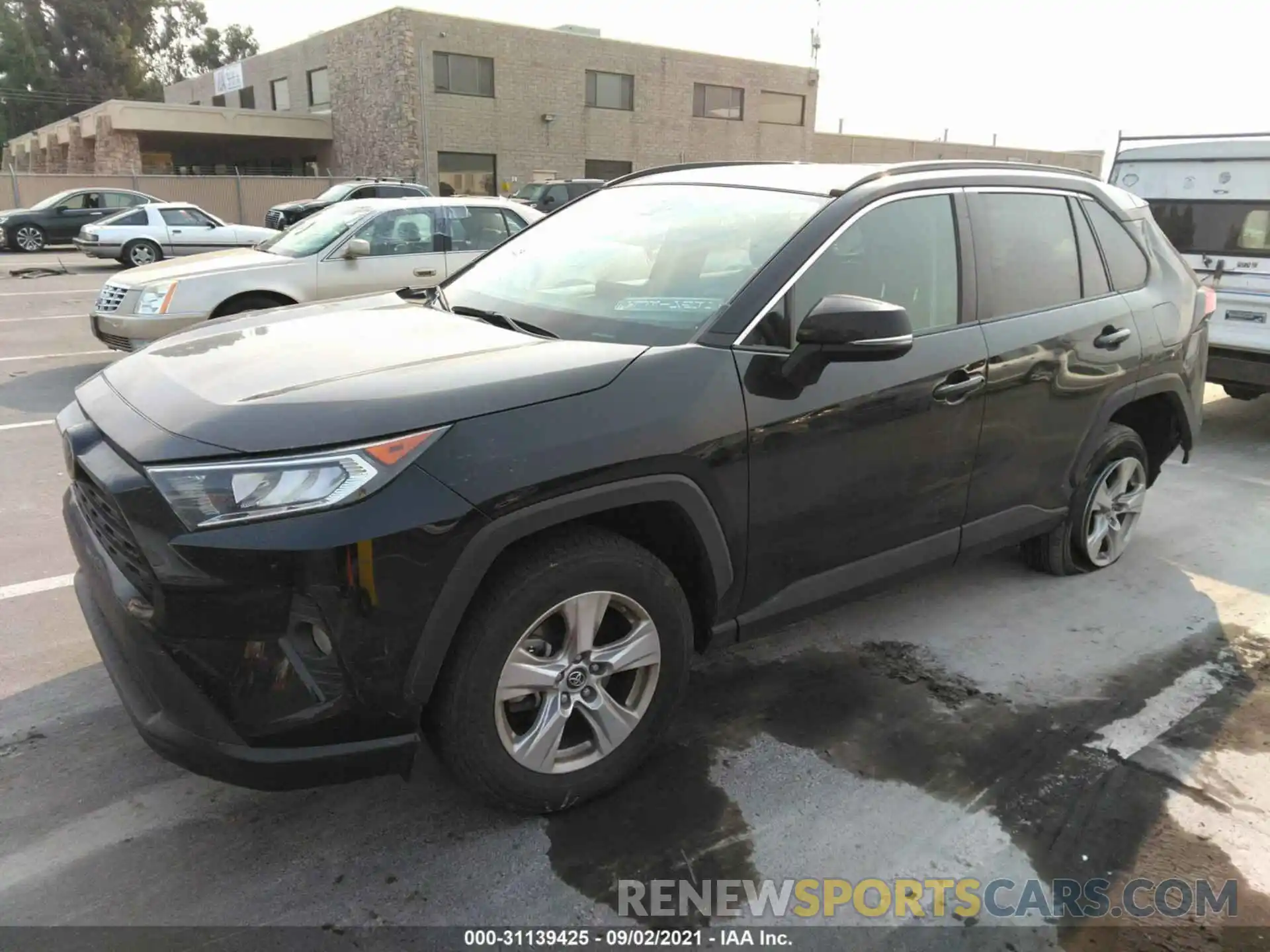 2 Photograph of a damaged car 2T3W1RFV0KW013697 TOYOTA RAV4 2019