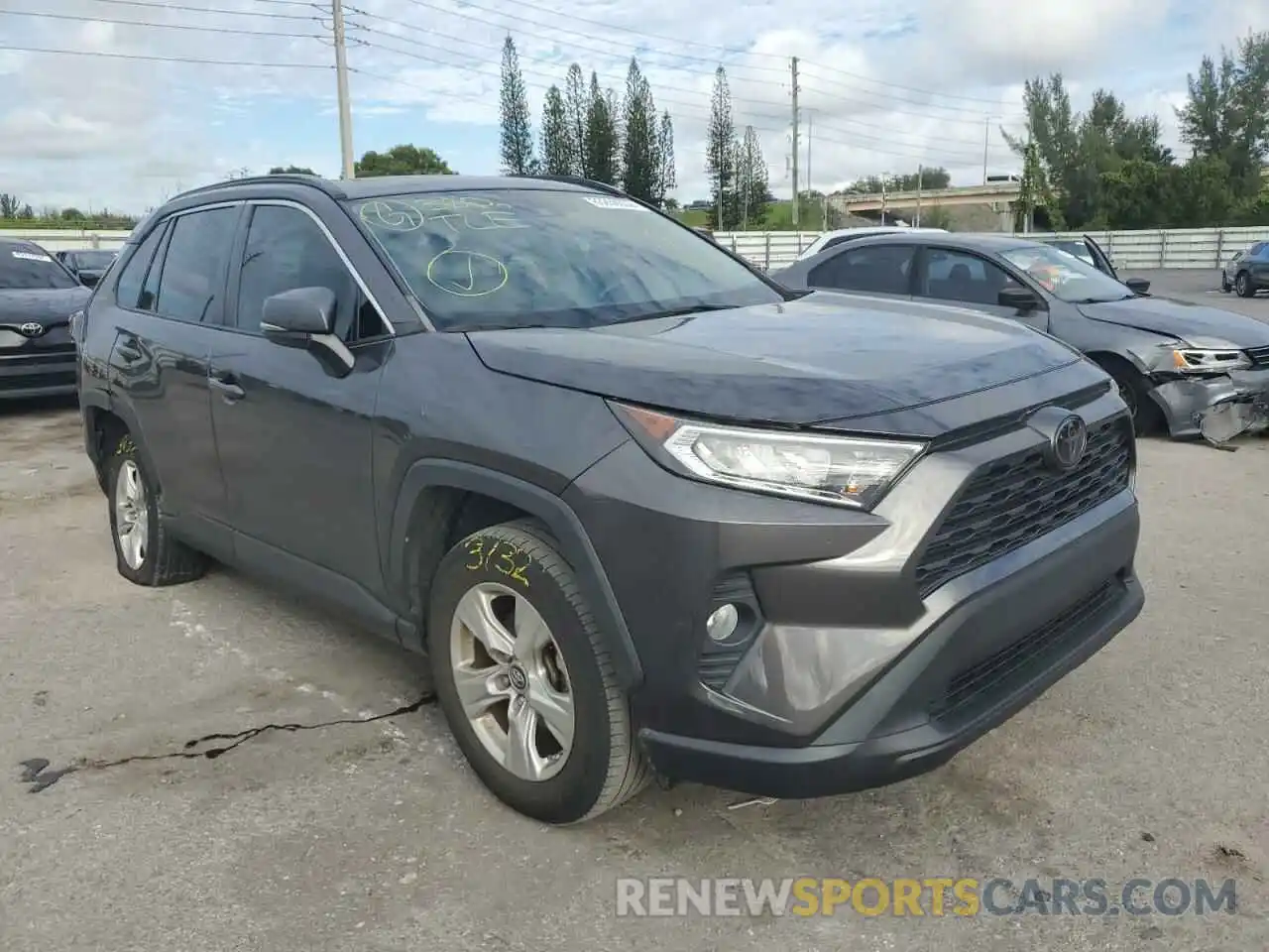 1 Photograph of a damaged car 2T3W1RFV0KW022447 TOYOTA RAV4 2019