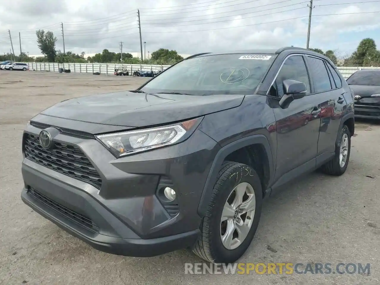 2 Photograph of a damaged car 2T3W1RFV0KW022447 TOYOTA RAV4 2019