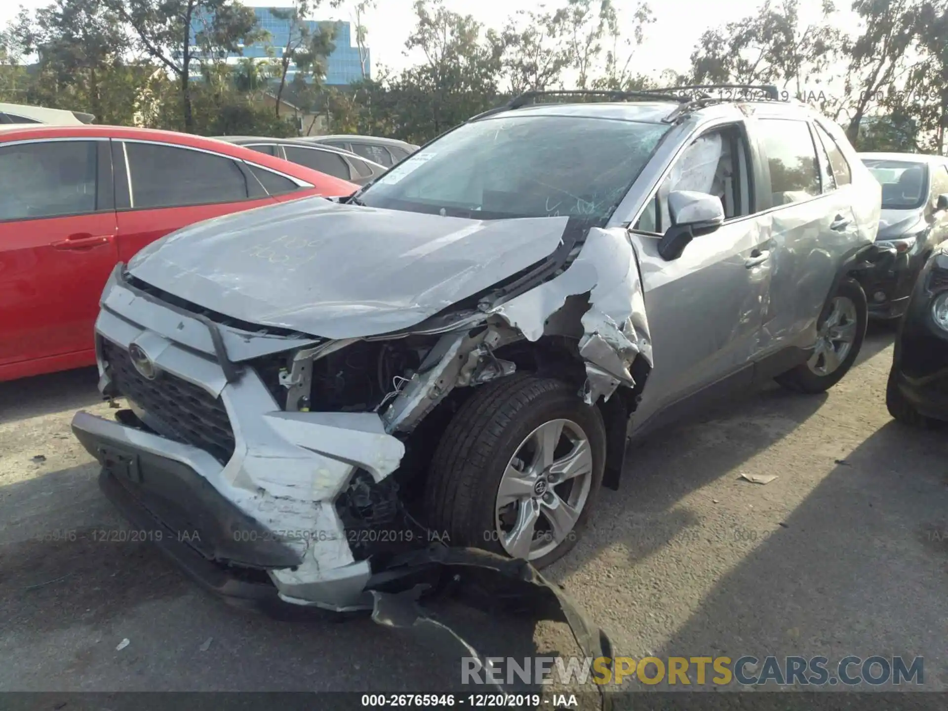 2 Photograph of a damaged car 2T3W1RFV0KW040964 TOYOTA RAV4 2019