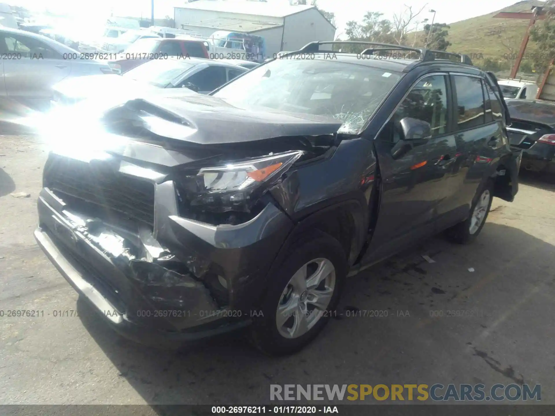 2 Photograph of a damaged car 2T3W1RFV2KC029725 TOYOTA RAV4 2019