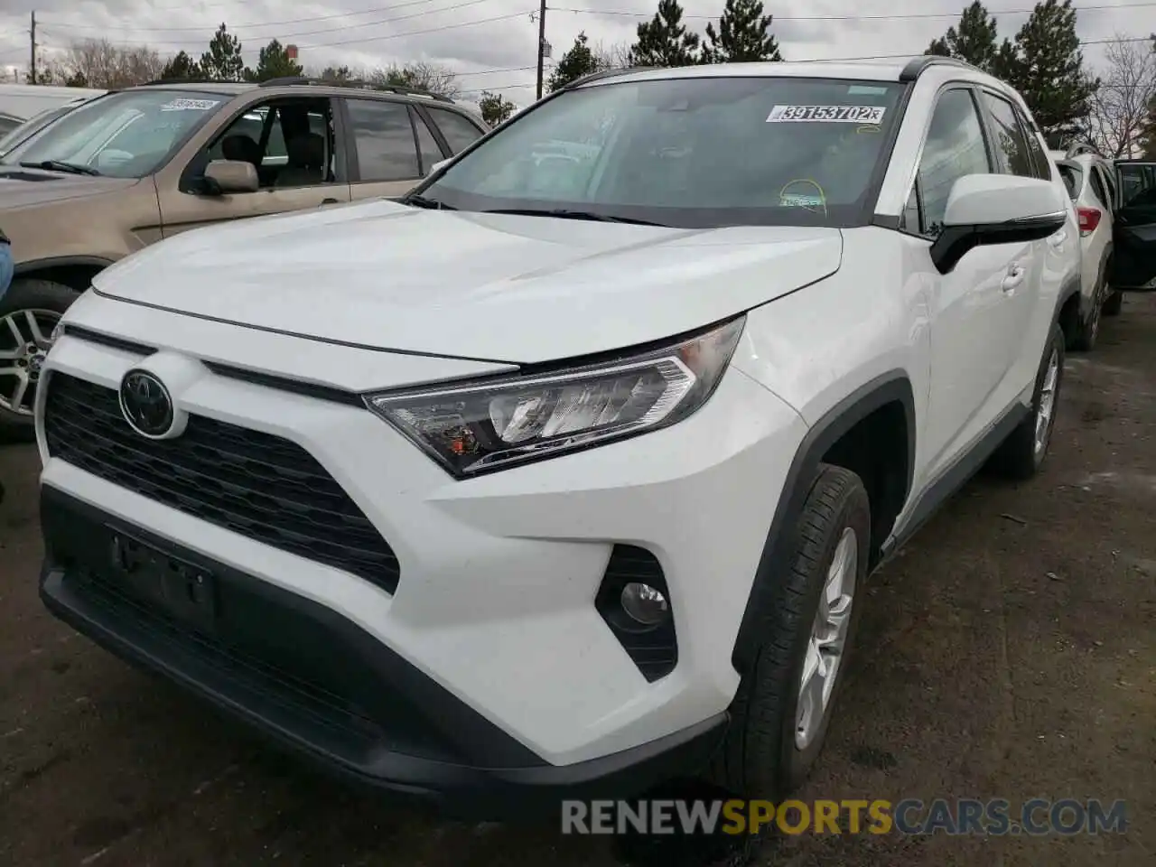 2 Photograph of a damaged car 2T3W1RFV3KC011279 TOYOTA RAV4 2019