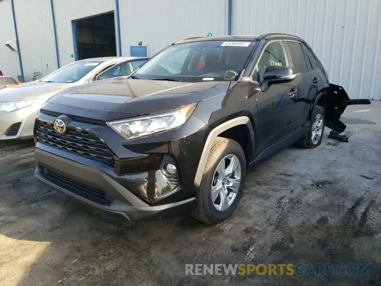 2 Photograph of a damaged car 2T3W1RFV3KW003827 TOYOTA RAV4 2019