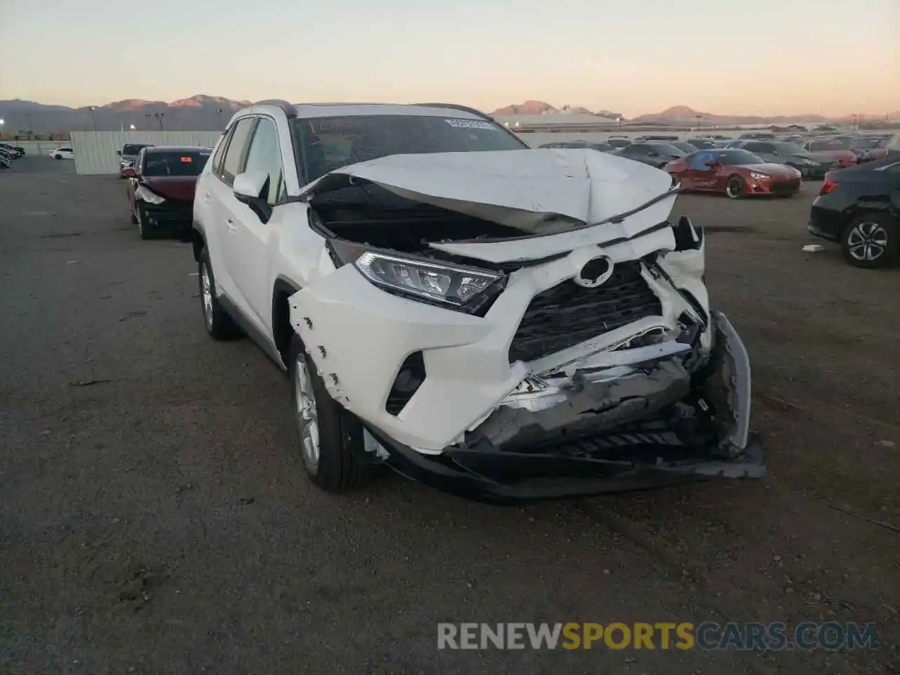 1 Photograph of a damaged car 2T3W1RFV4KC028883 TOYOTA RAV4 2019