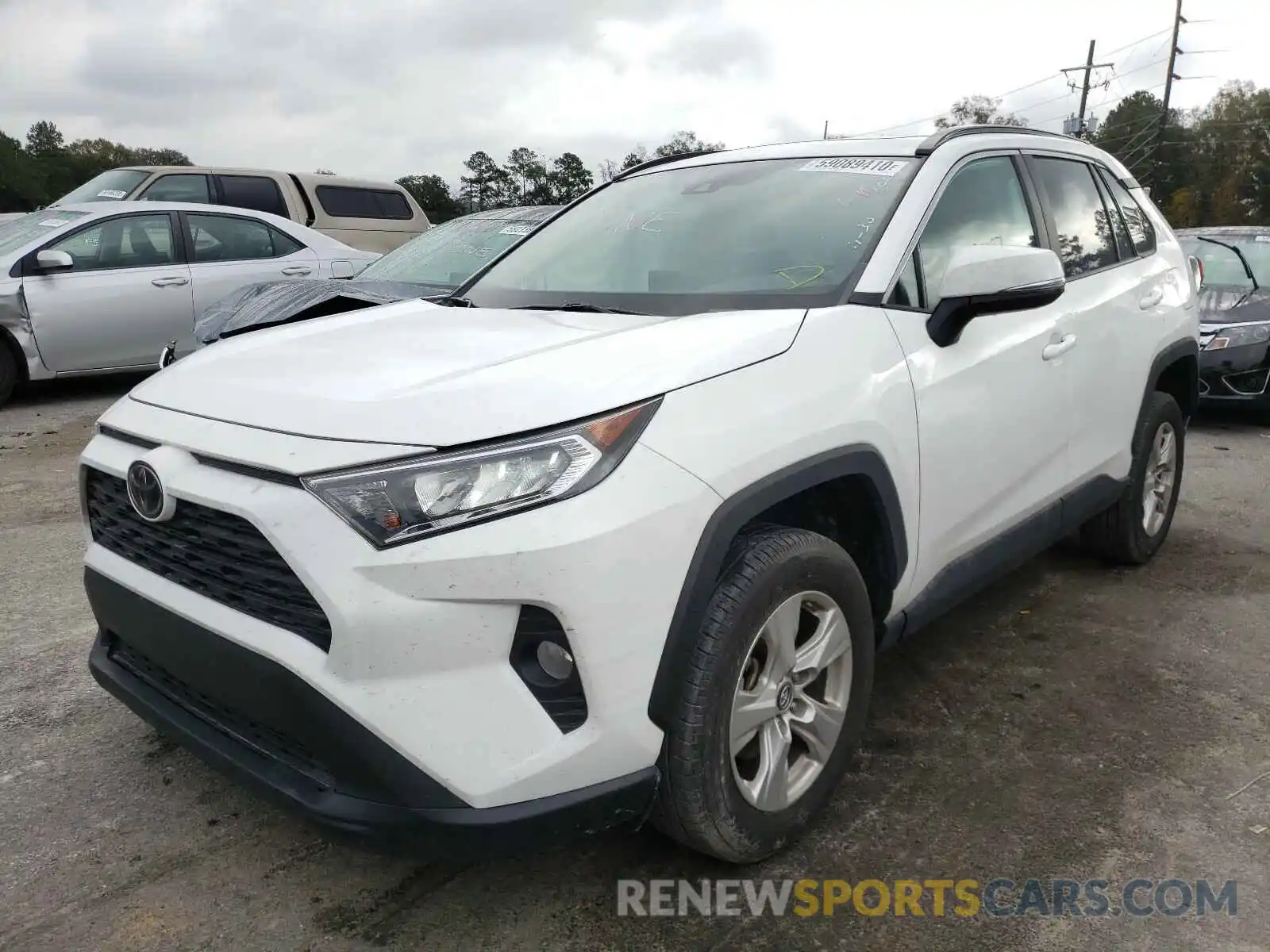 2 Photograph of a damaged car 2T3W1RFV4KC031007 TOYOTA RAV4 2019