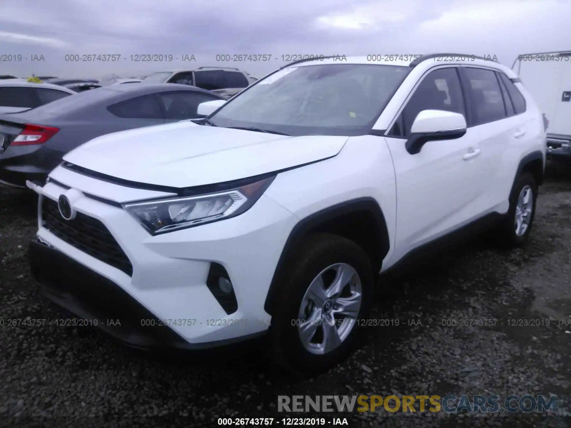 2 Photograph of a damaged car 2T3W1RFV4KW001486 TOYOTA RAV4 2019