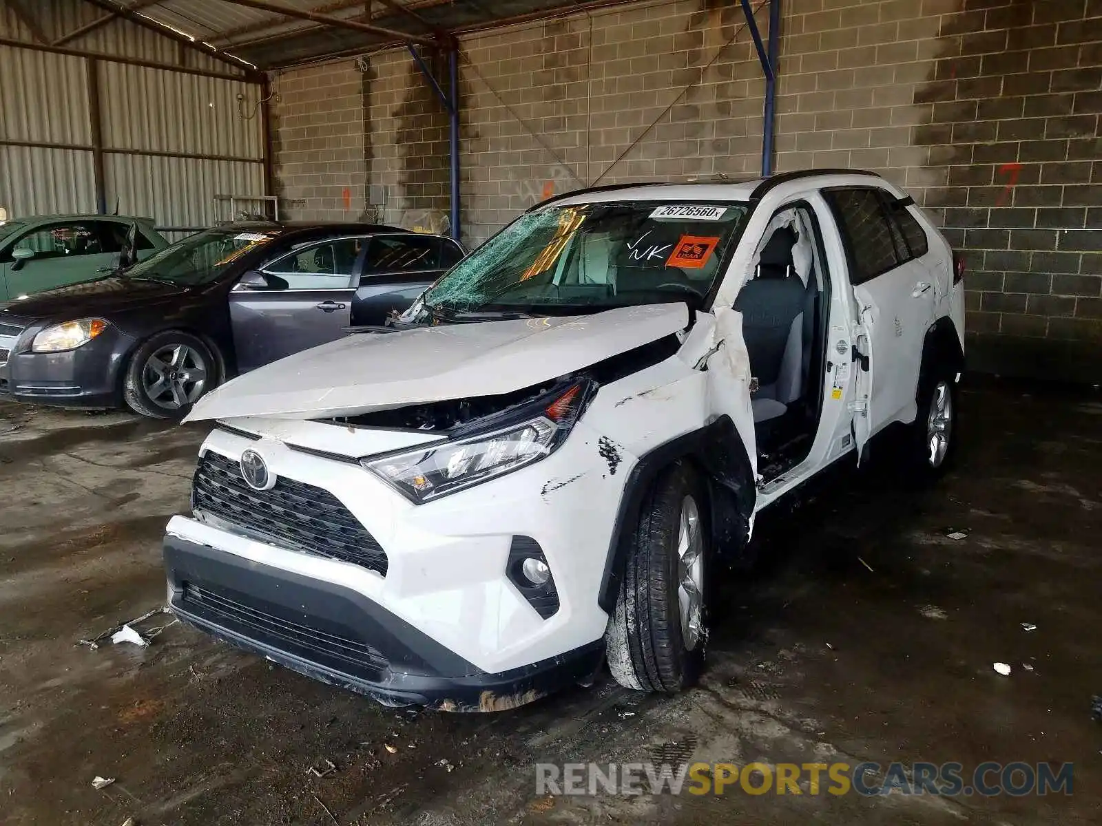 2 Photograph of a damaged car 2T3W1RFV5KC031100 TOYOTA RAV4 2019