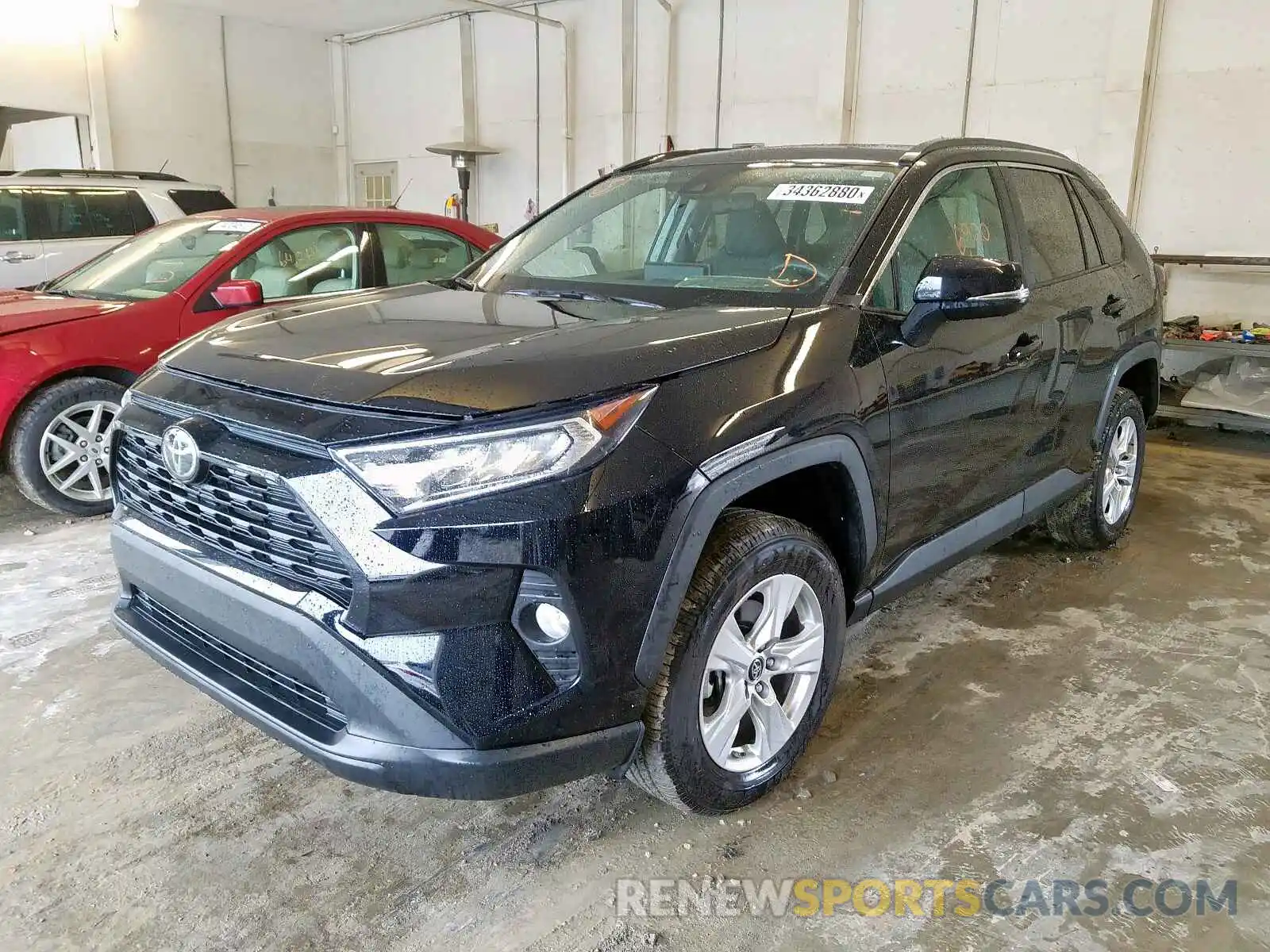 2 Photograph of a damaged car 2T3W1RFV5KW030057 TOYOTA RAV4 2019