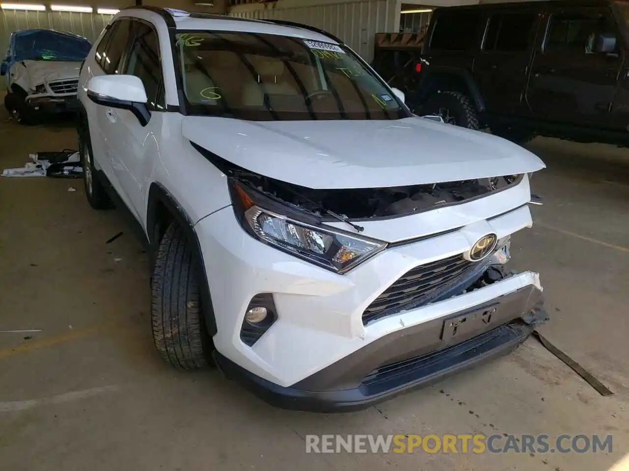 1 Photograph of a damaged car 2T3W1RFV6KC019165 TOYOTA RAV4 2019