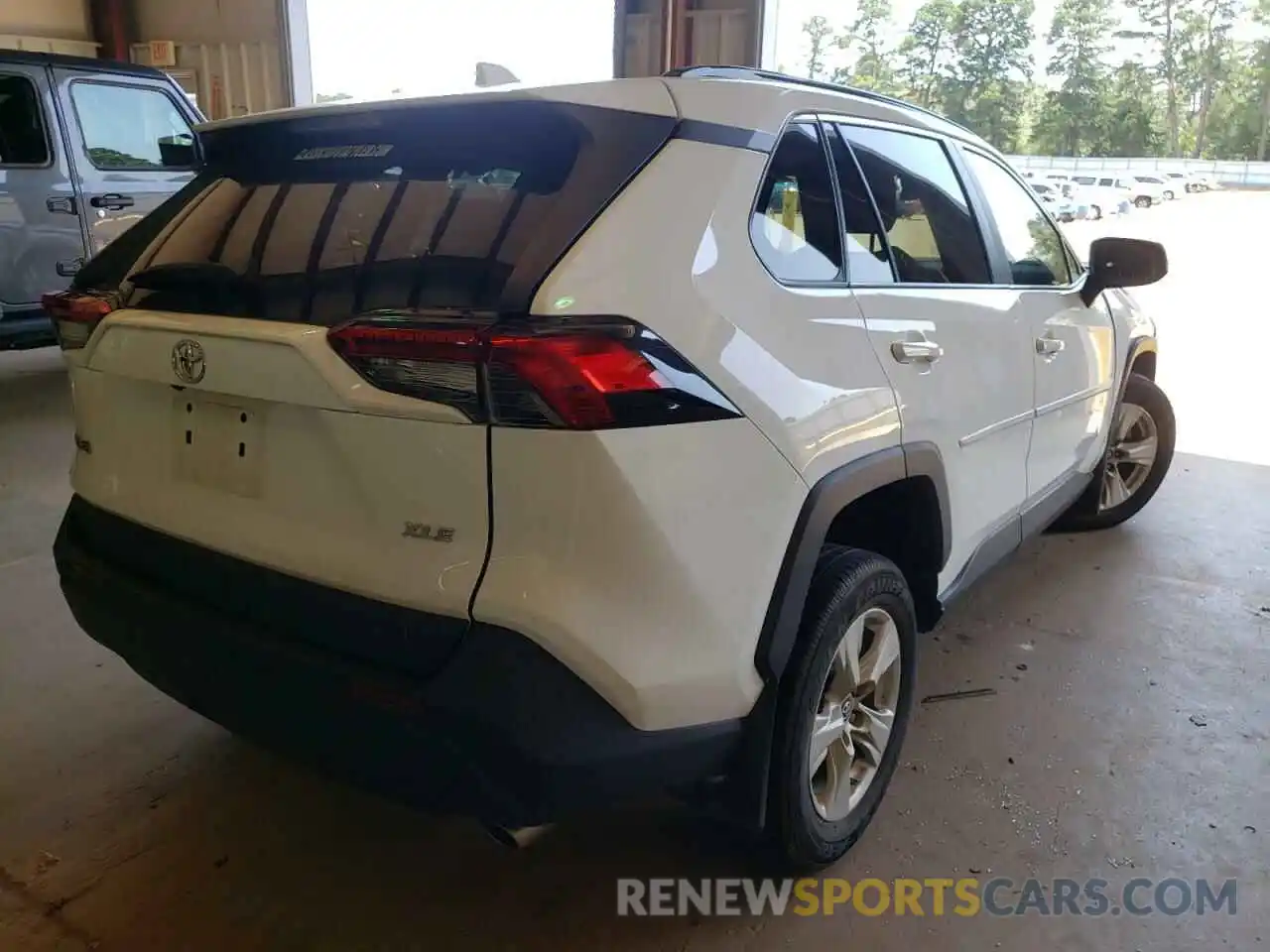 4 Photograph of a damaged car 2T3W1RFV6KC019165 TOYOTA RAV4 2019