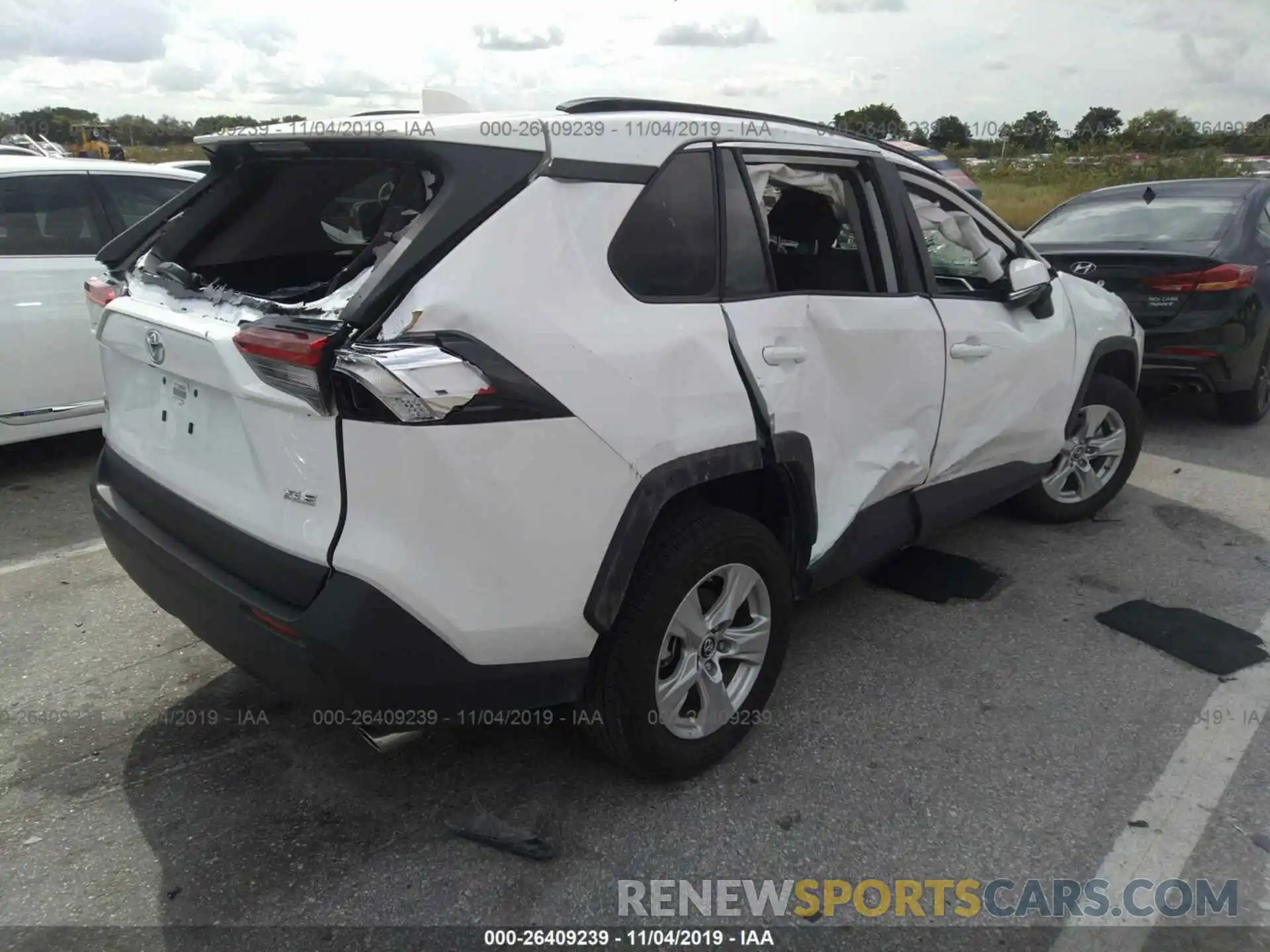 4 Photograph of a damaged car 2T3W1RFV7KW007458 TOYOTA RAV4 2019