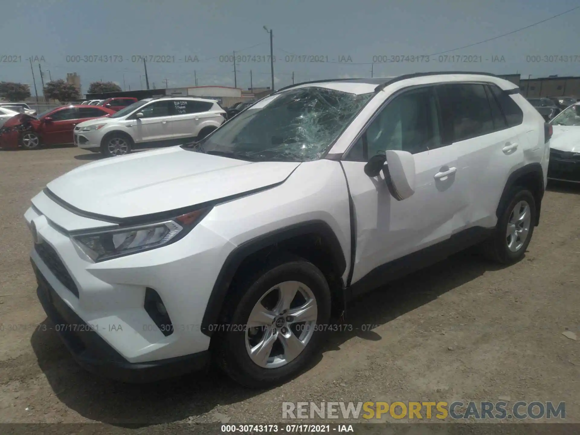 2 Photograph of a damaged car 2T3W1RFVXKC025759 TOYOTA RAV4 2019