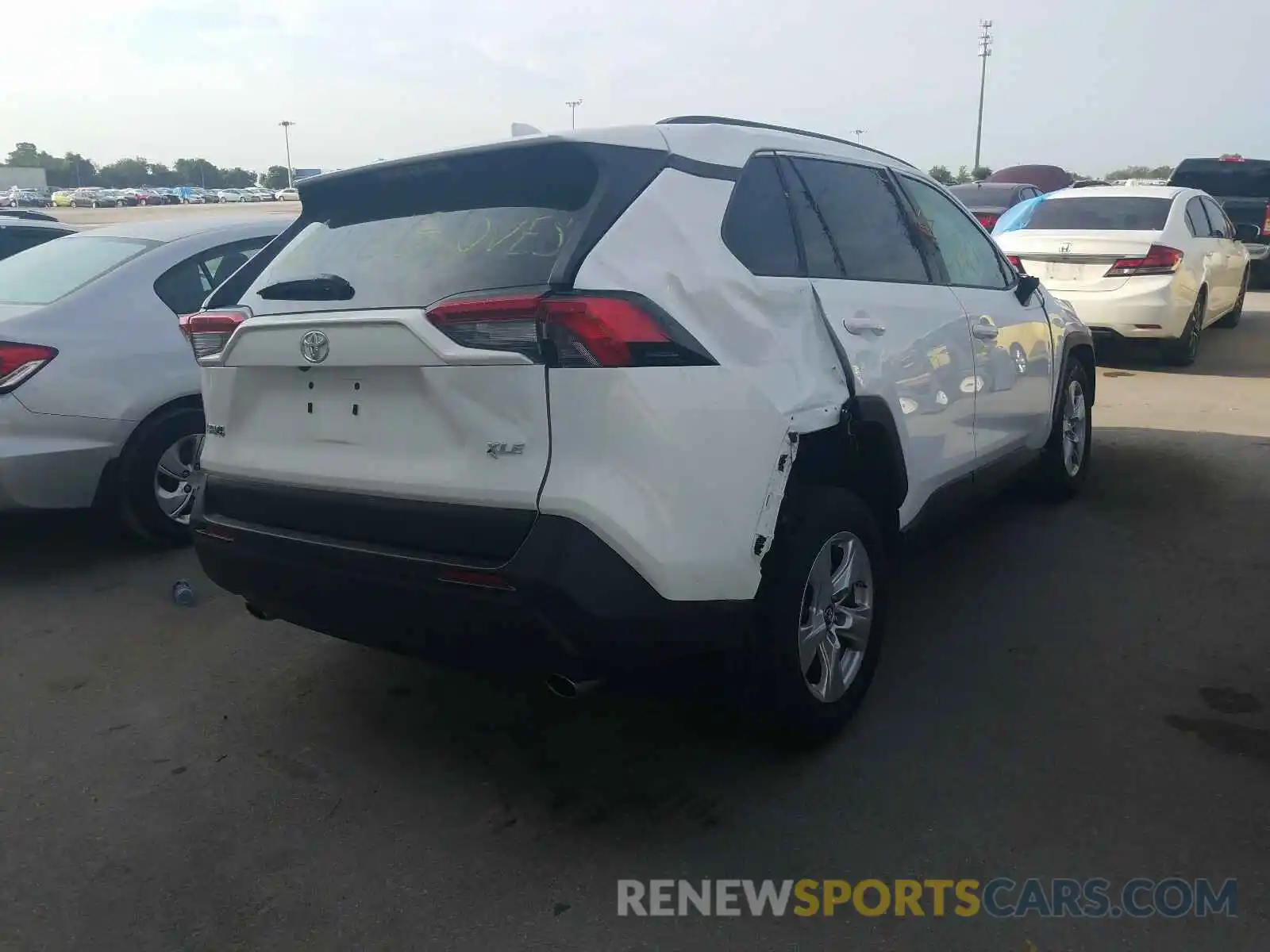 4 Photograph of a damaged car 2T3W1RFVXKC029603 TOYOTA RAV4 2019