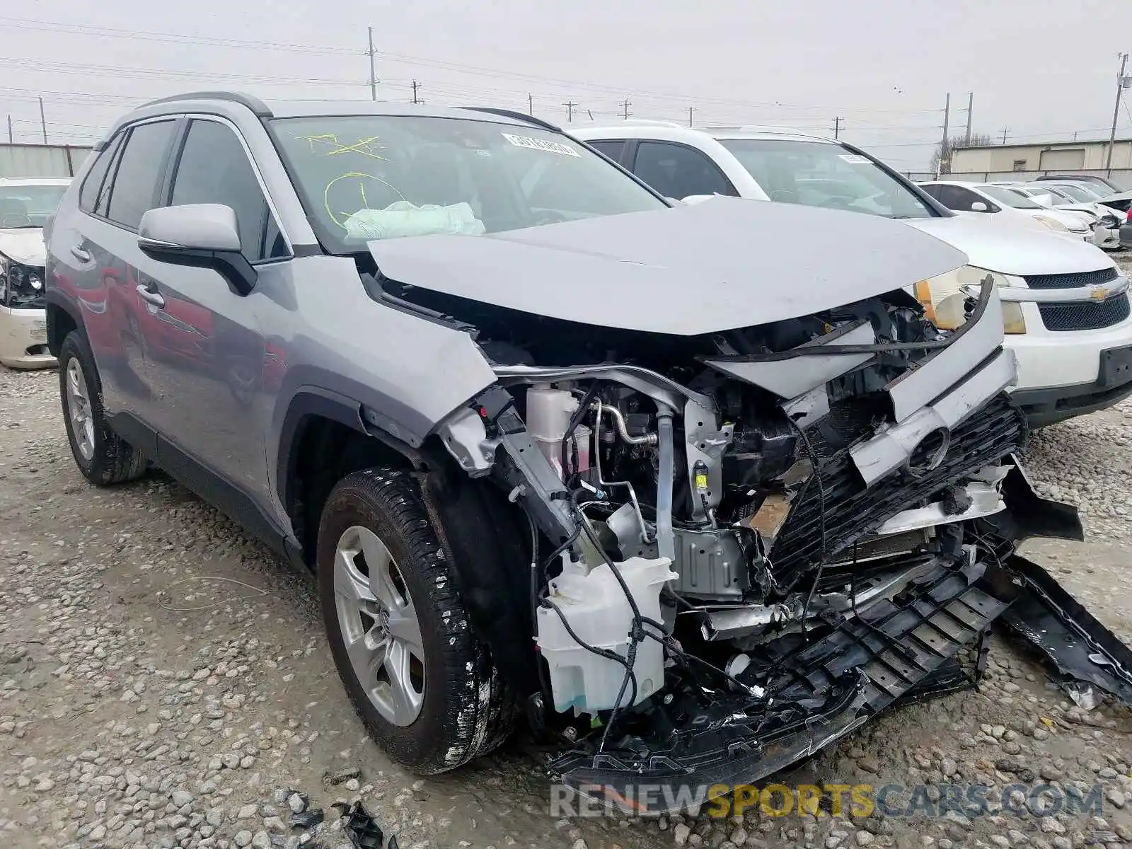 1 Photograph of a damaged car 2T3W1RFVXKW016428 TOYOTA RAV4 2019