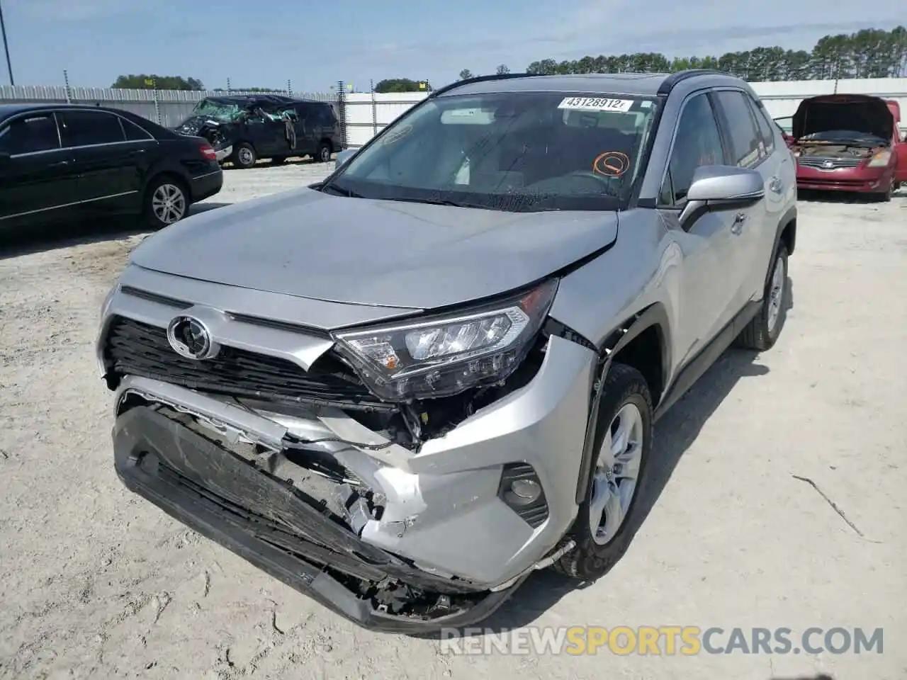 2 Photograph of a damaged car 2T3W1RFVXKW024836 TOYOTA RAV4 2019