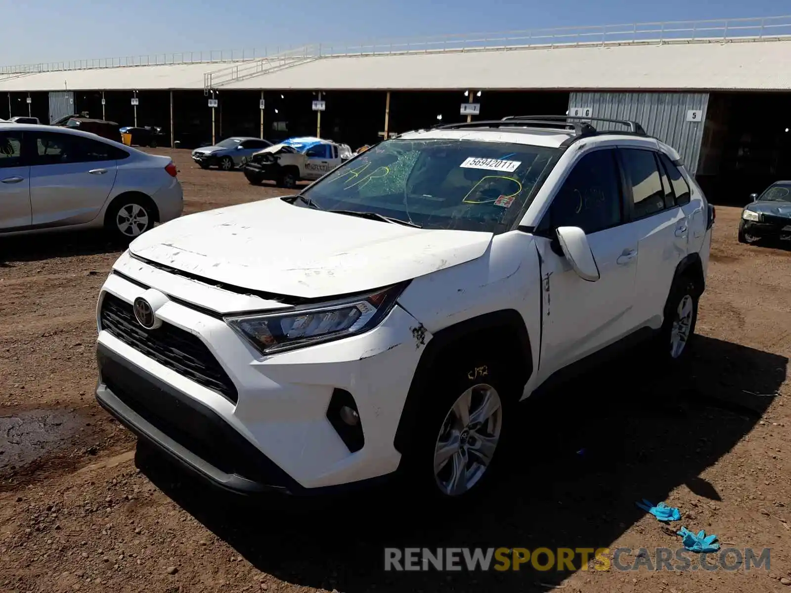 2 Photograph of a damaged car 2T3W1RFVXKW025680 TOYOTA RAV4 2019