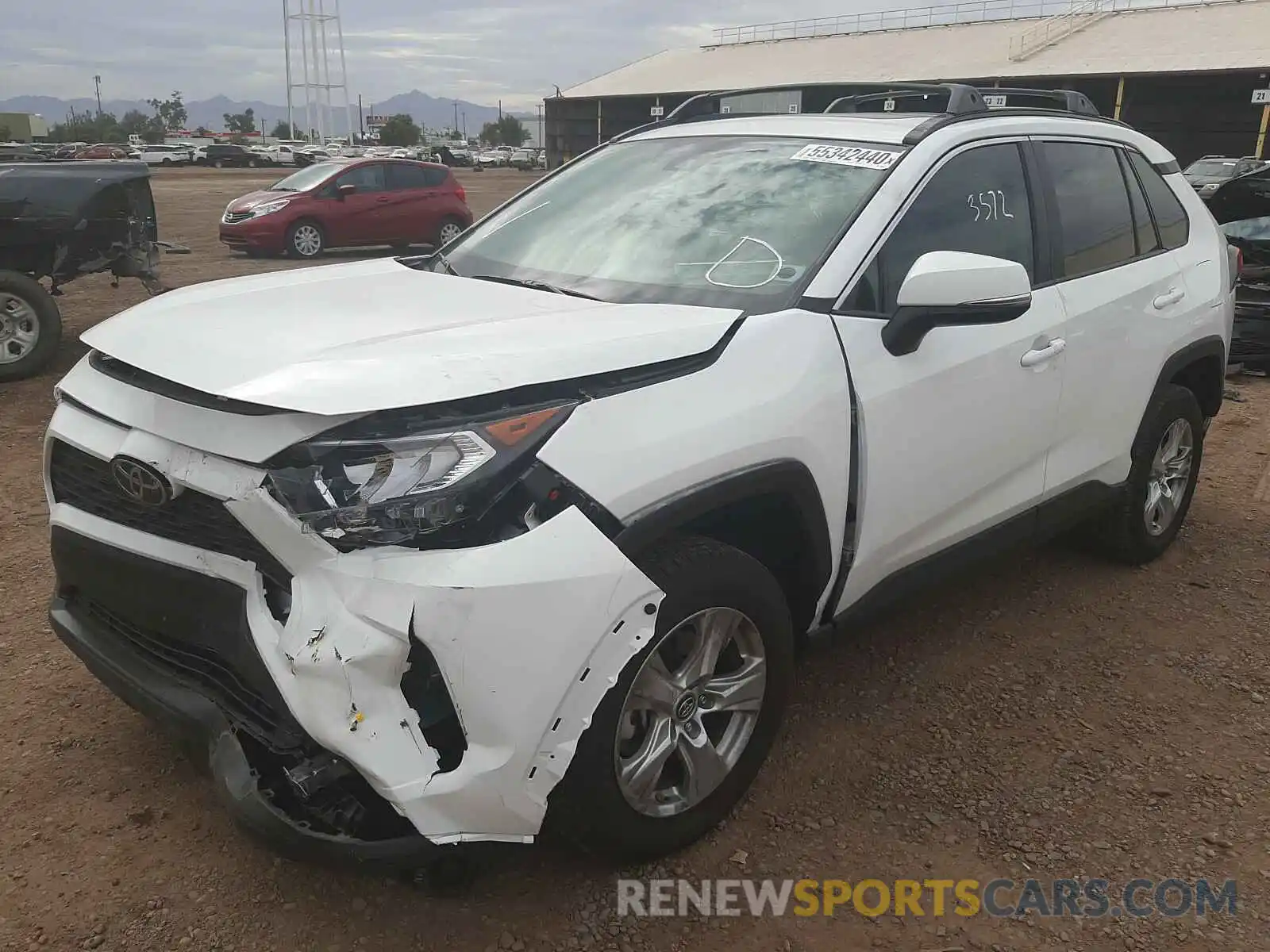 2 Photograph of a damaged car 2T3W1RFVXKW030961 TOYOTA RAV4 2019