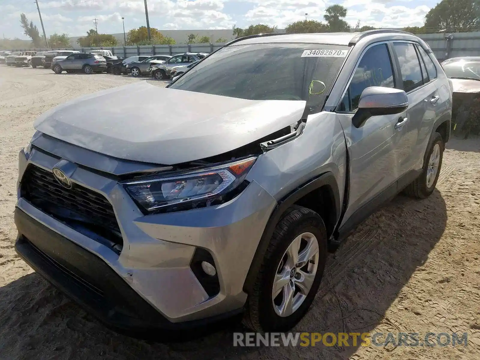 2 Photograph of a damaged car 2T3W1RFVXKW032273 TOYOTA RAV4 2019