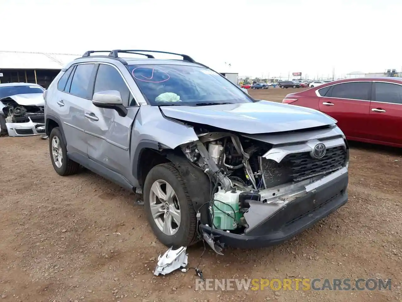 1 Photograph of a damaged car 2T3W1RFVXKW056329 TOYOTA RAV4 2019