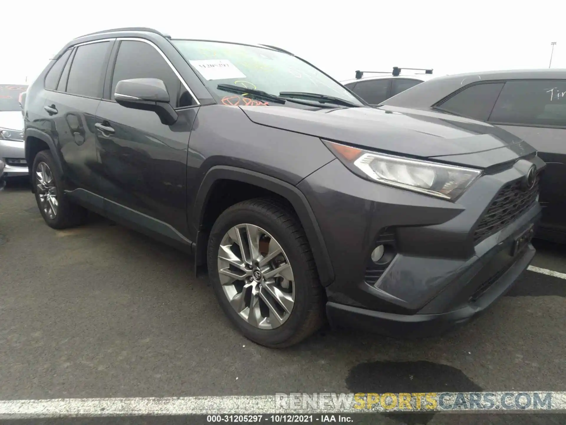 1 Photograph of a damaged car JTMA1RFV0KD014324 TOYOTA RAV4 2019