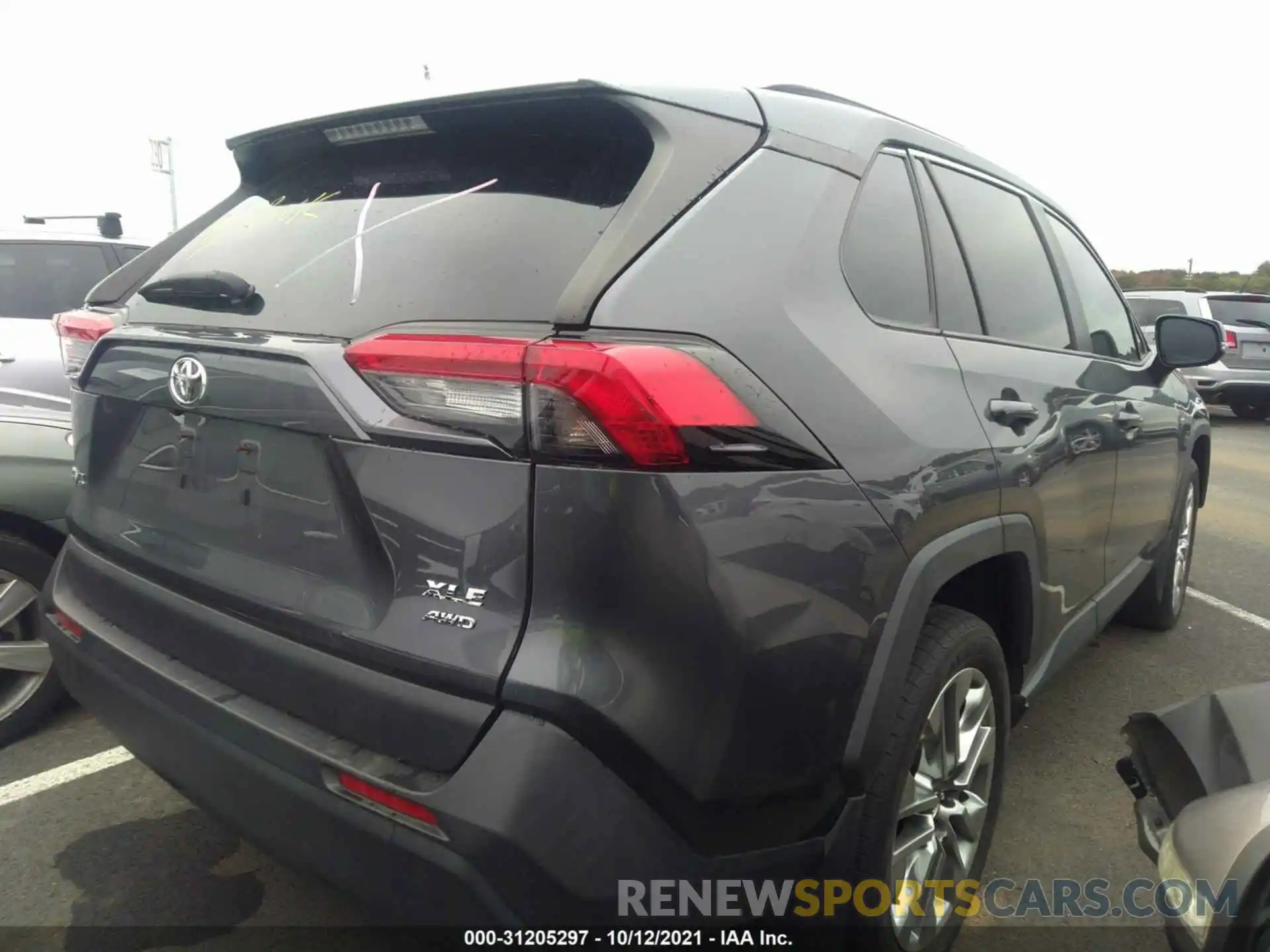 4 Photograph of a damaged car JTMA1RFV0KD014324 TOYOTA RAV4 2019