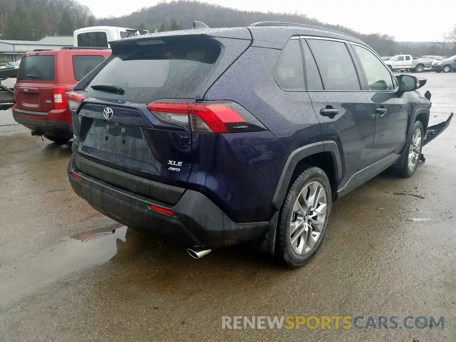 4 Photograph of a damaged car JTMA1RFV0KD018180 TOYOTA RAV4 2019