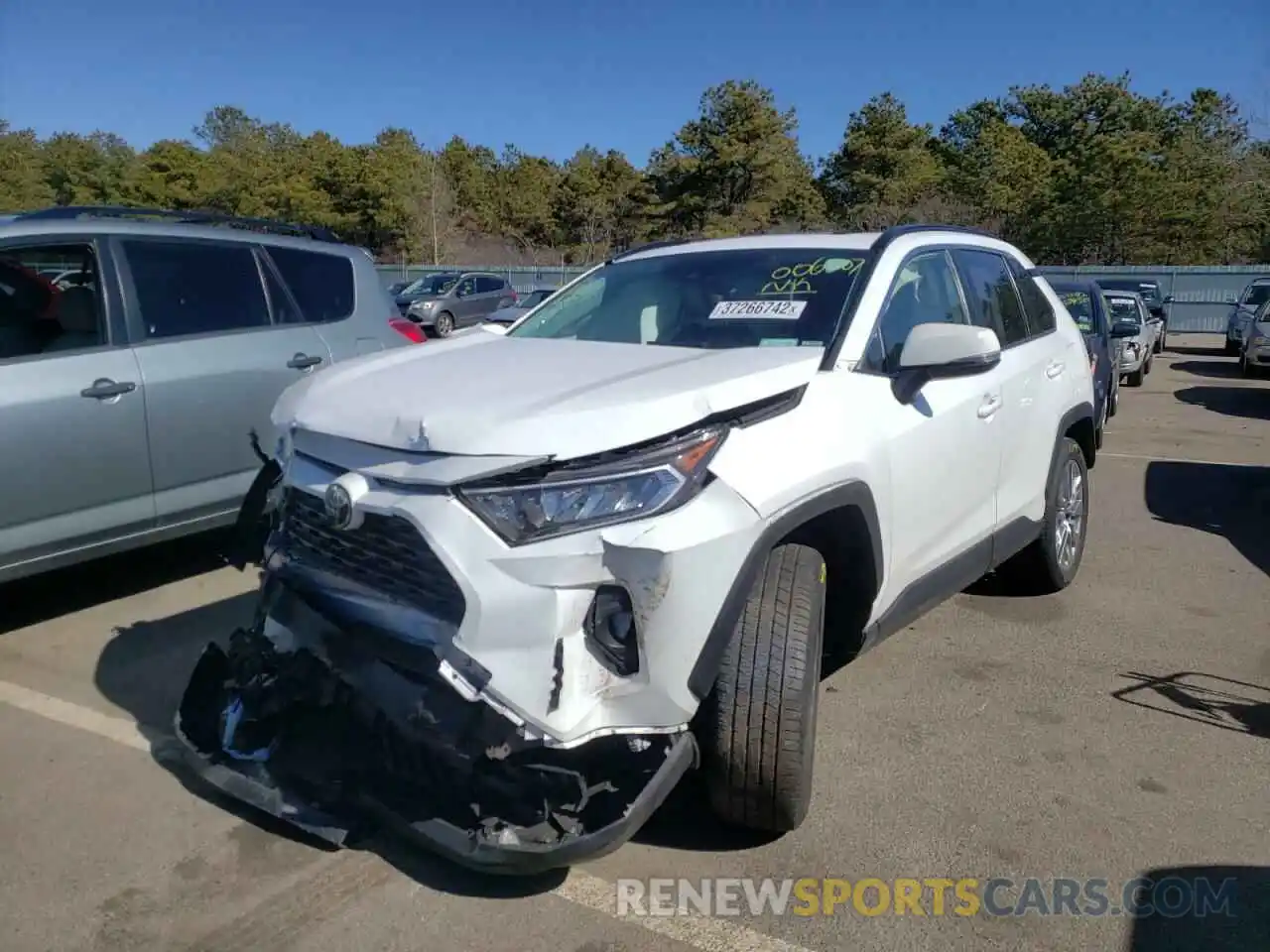 2 Photograph of a damaged car JTMA1RFV0KJ006807 TOYOTA RAV4 2019