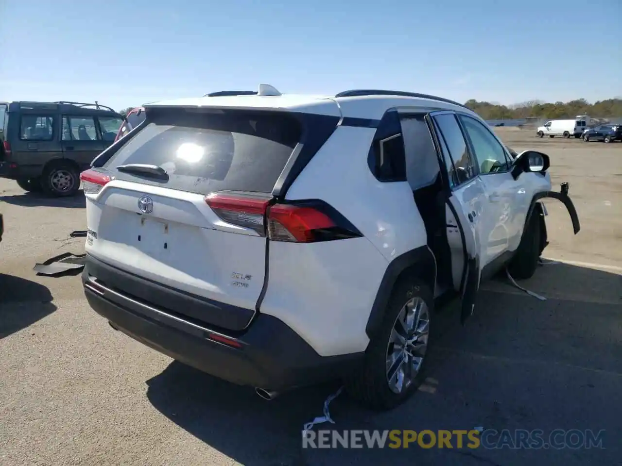 4 Photograph of a damaged car JTMA1RFV0KJ006807 TOYOTA RAV4 2019