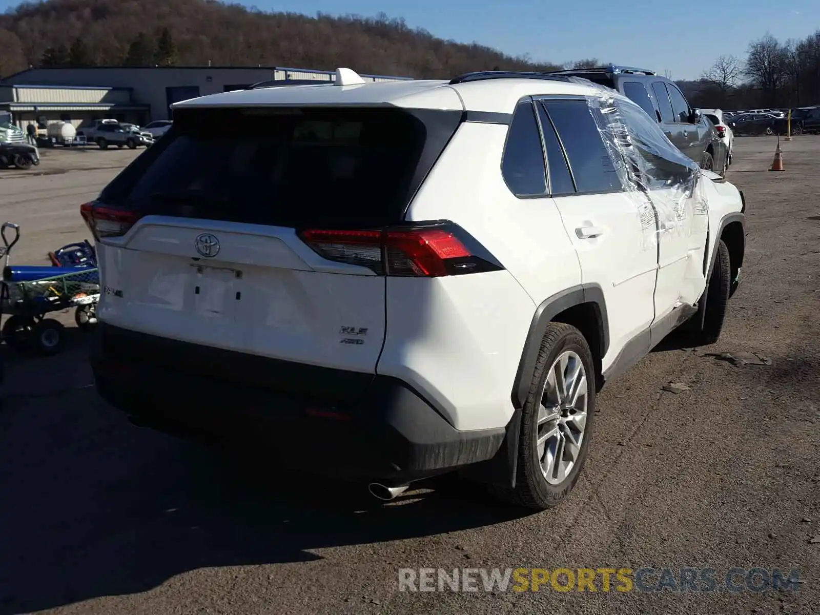 4 Photograph of a damaged car JTMA1RFV1KD008242 TOYOTA RAV4 2019