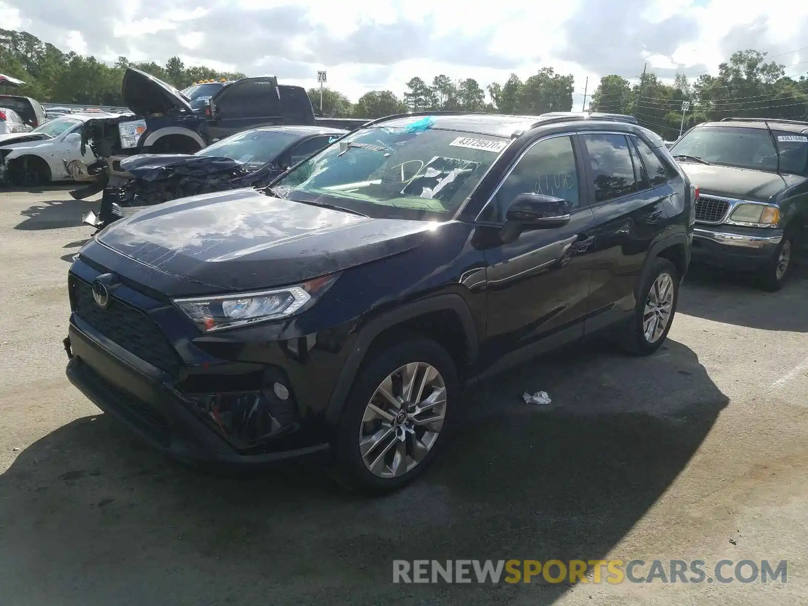 2 Photograph of a damaged car JTMA1RFV1KD010444 TOYOTA RAV4 2019