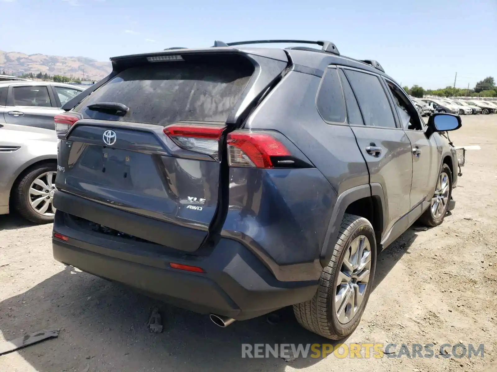 4 Photograph of a damaged car JTMA1RFV1KD011318 TOYOTA RAV4 2019