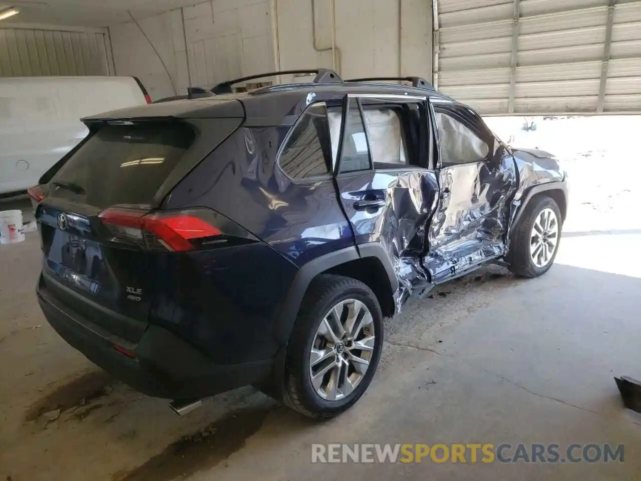 4 Photograph of a damaged car JTMA1RFV1KD504786 TOYOTA RAV4 2019