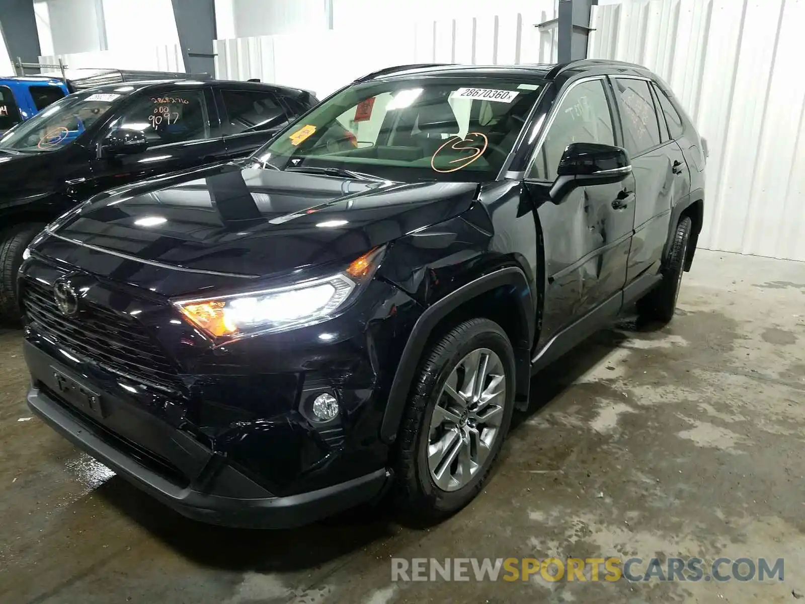 2 Photograph of a damaged car JTMA1RFV1KD517179 TOYOTA RAV4 2019