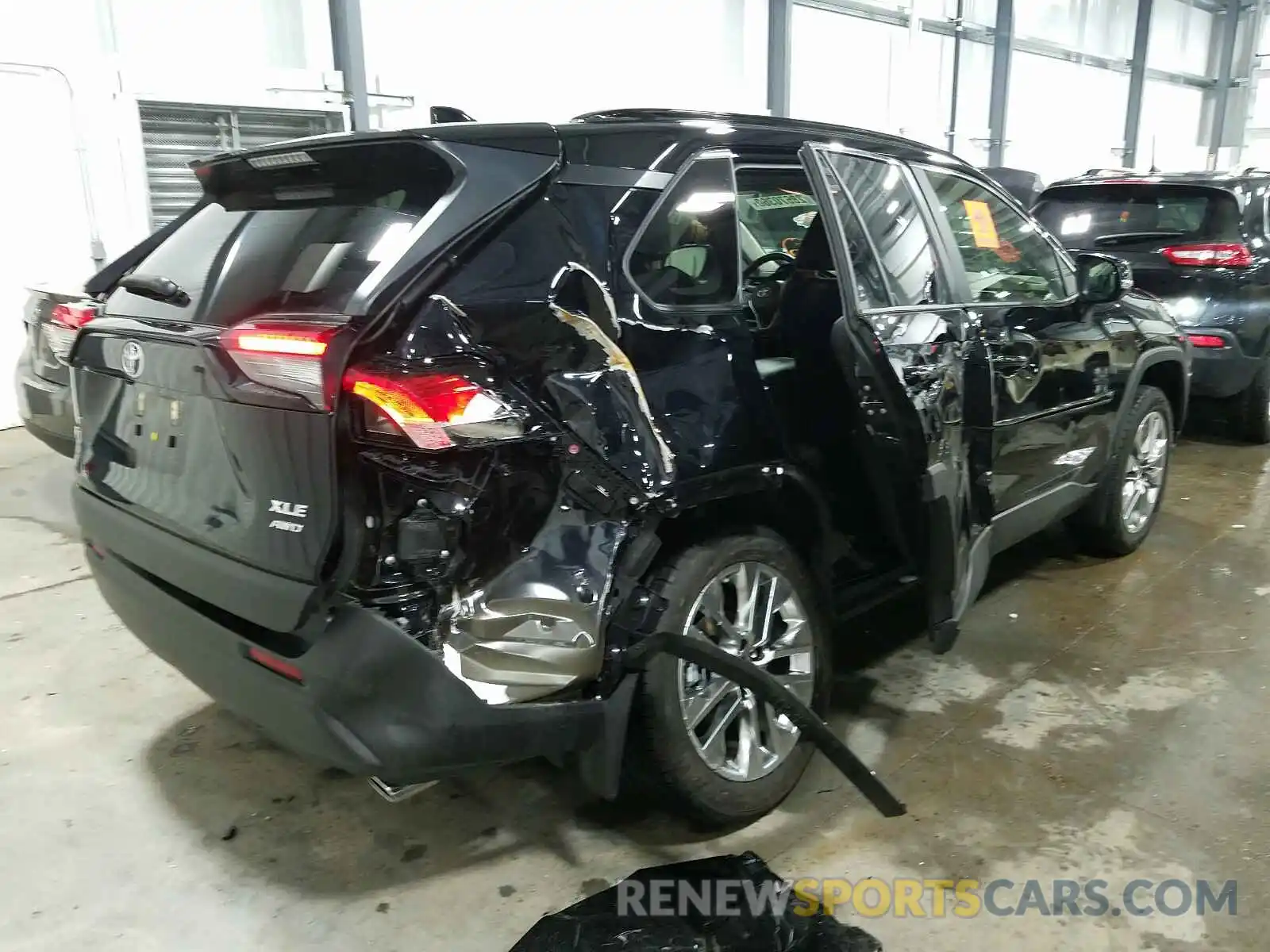 4 Photograph of a damaged car JTMA1RFV1KD517179 TOYOTA RAV4 2019