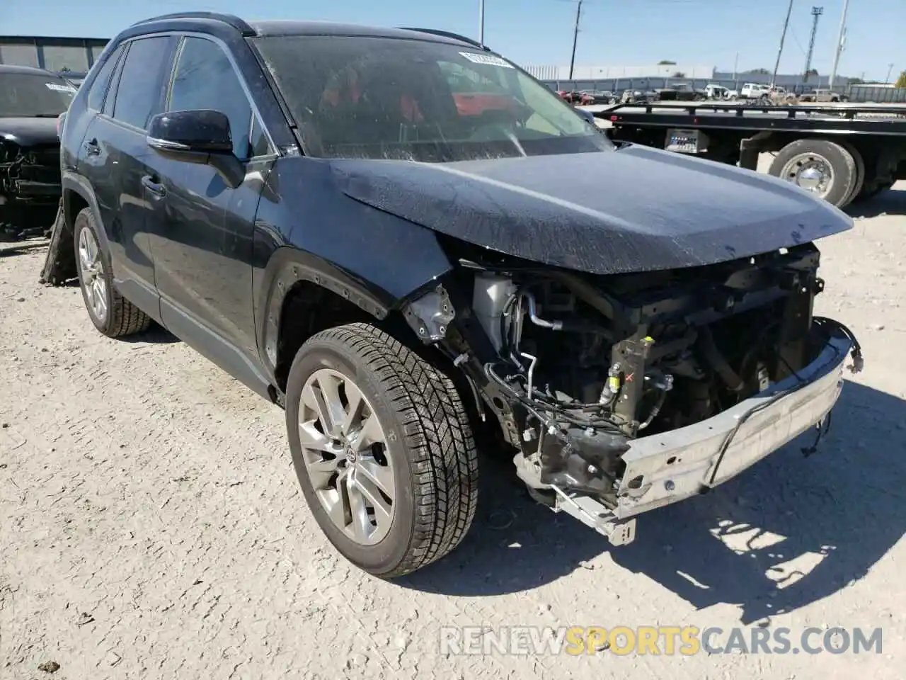 1 Photograph of a damaged car JTMA1RFV2KD003695 TOYOTA RAV4 2019