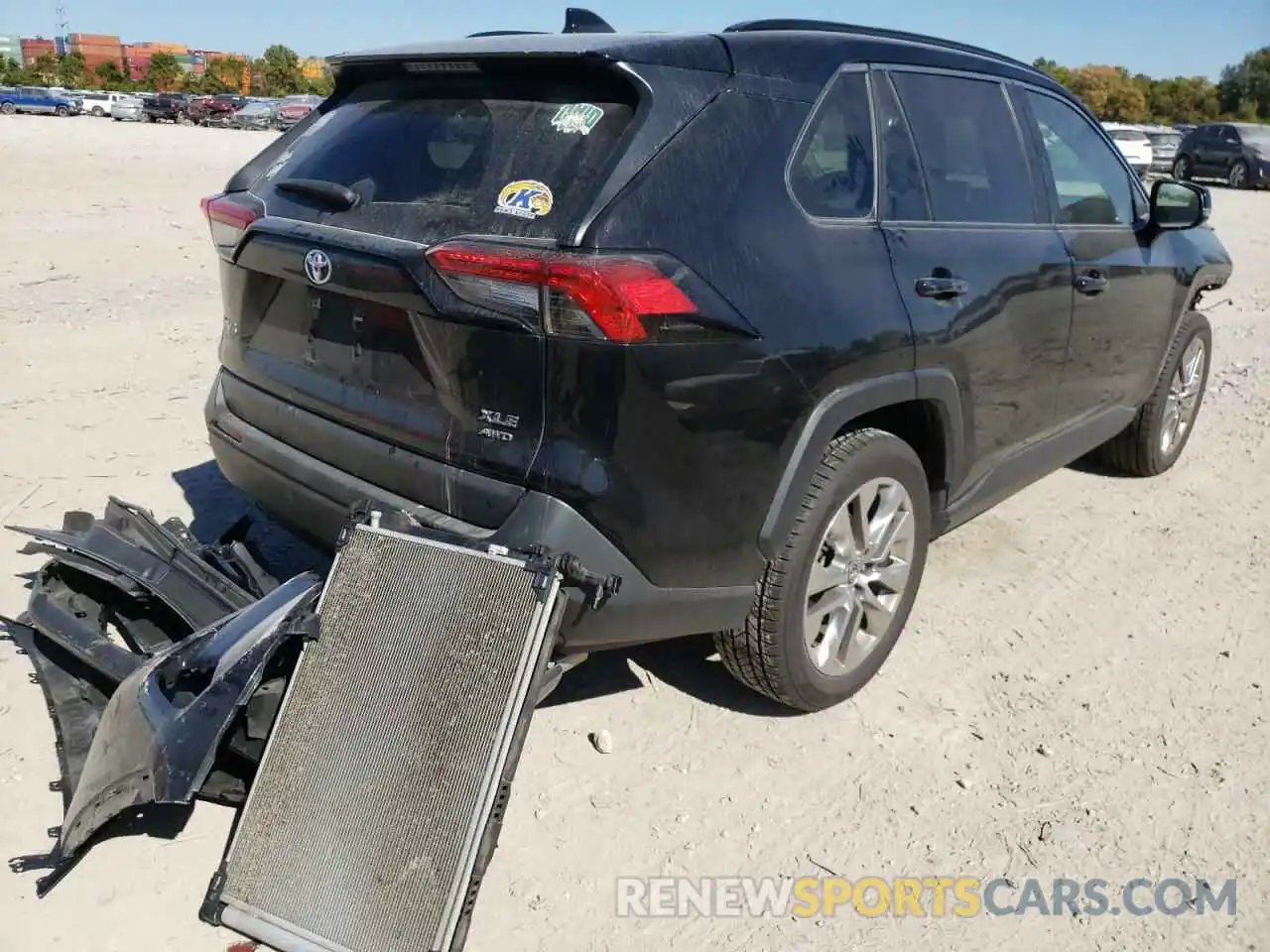 4 Photograph of a damaged car JTMA1RFV2KD003695 TOYOTA RAV4 2019