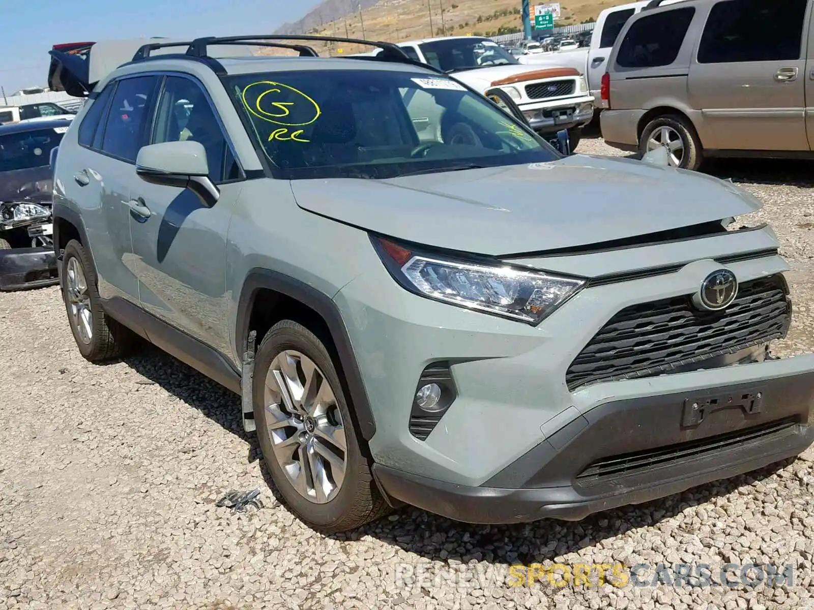 1 Photograph of a damaged car JTMA1RFV2KD008654 TOYOTA RAV4 2019