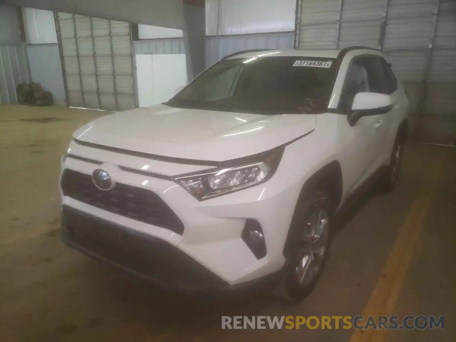 2 Photograph of a damaged car JTMA1RFV2KD026104 TOYOTA RAV4 2019