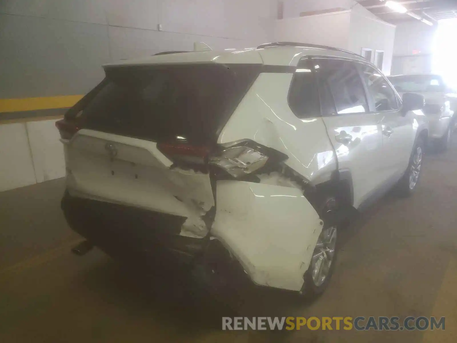 4 Photograph of a damaged car JTMA1RFV2KD026104 TOYOTA RAV4 2019