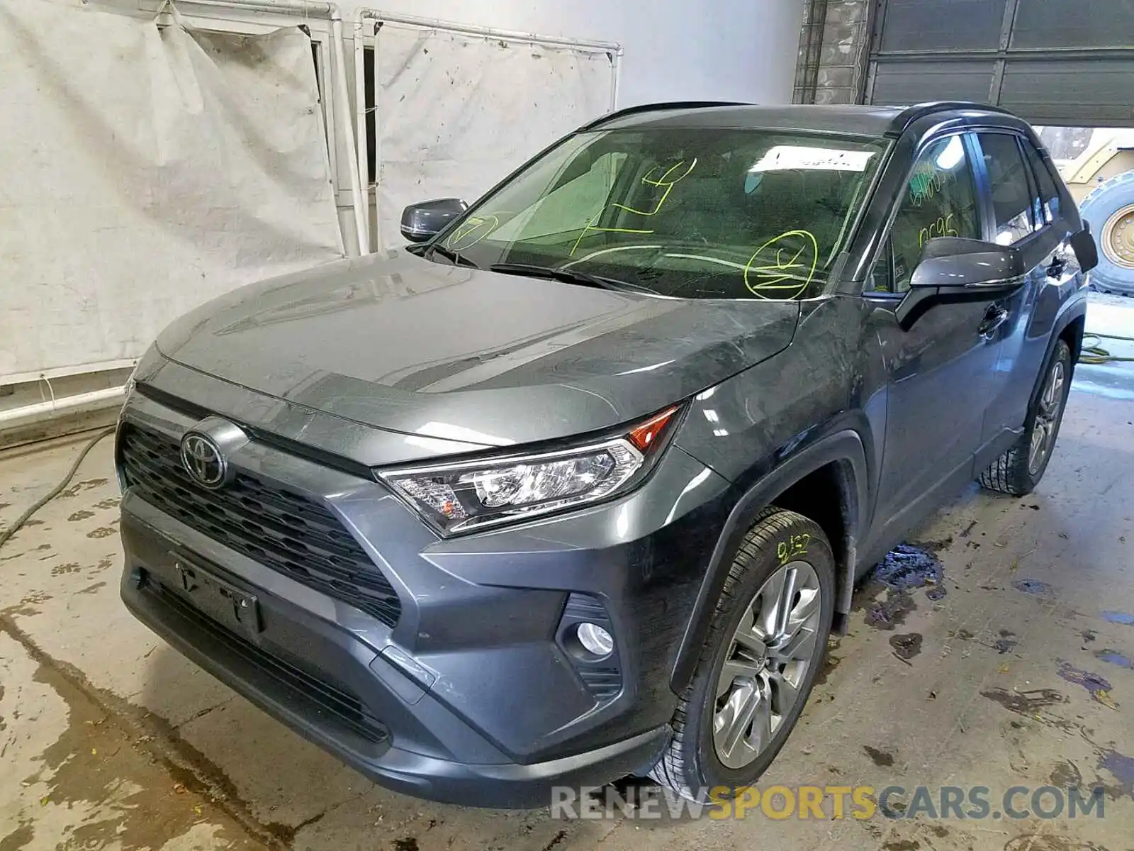 2 Photograph of a damaged car JTMA1RFV2KD513609 TOYOTA RAV4 2019