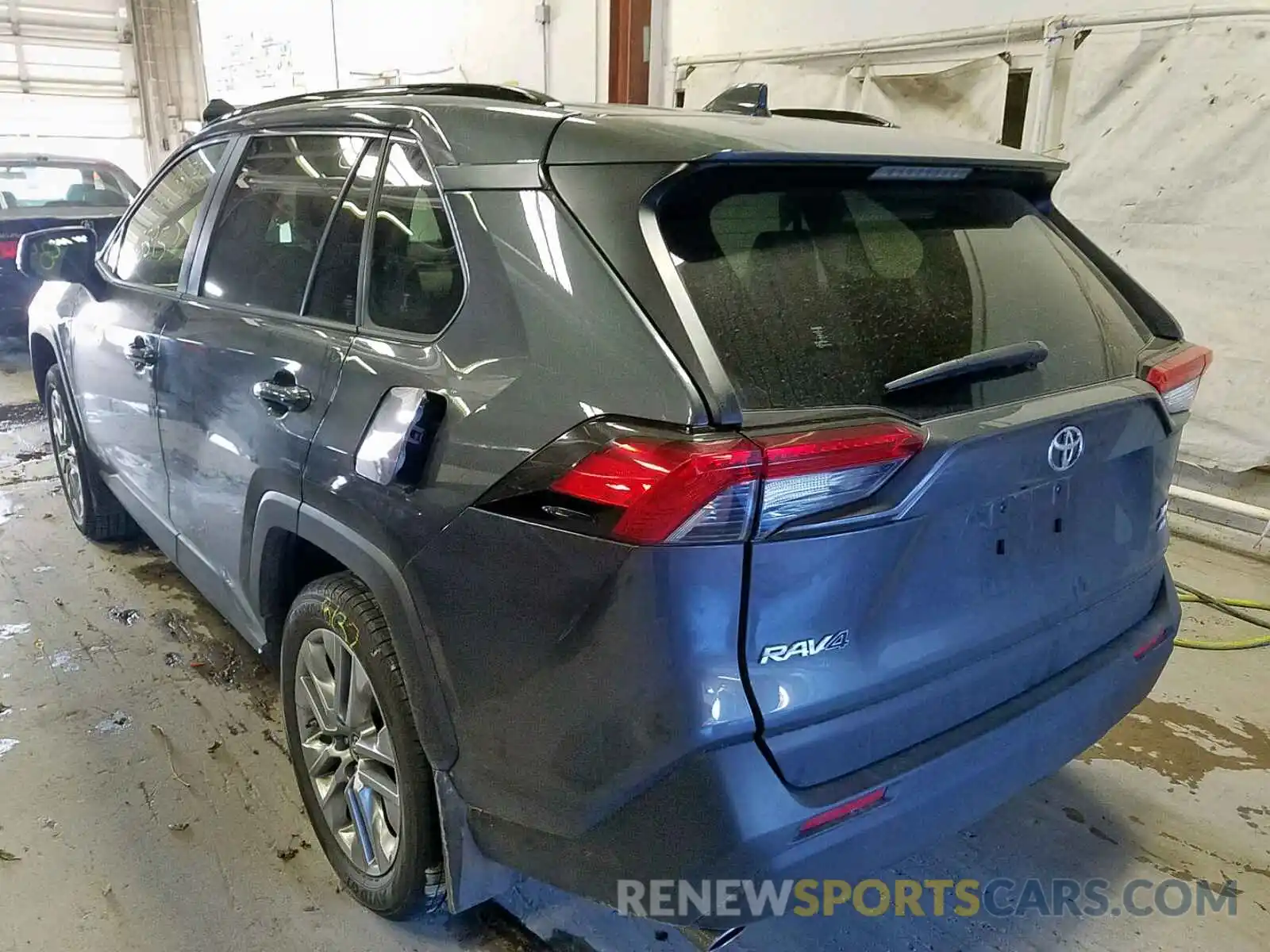 3 Photograph of a damaged car JTMA1RFV2KD513609 TOYOTA RAV4 2019