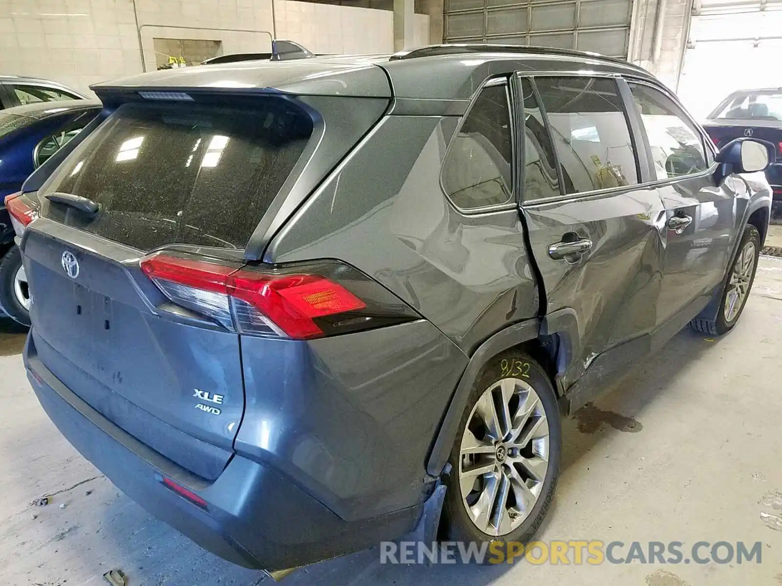 4 Photograph of a damaged car JTMA1RFV2KD513609 TOYOTA RAV4 2019