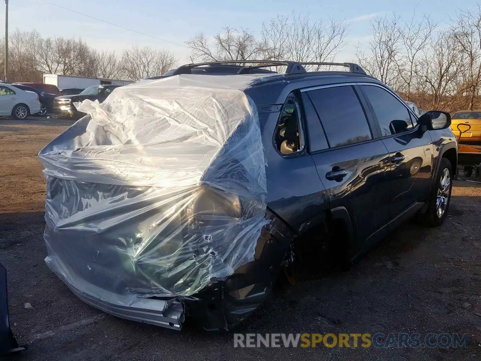 4 Photograph of a damaged car JTMA1RFV3KD017606 TOYOTA RAV4 2019