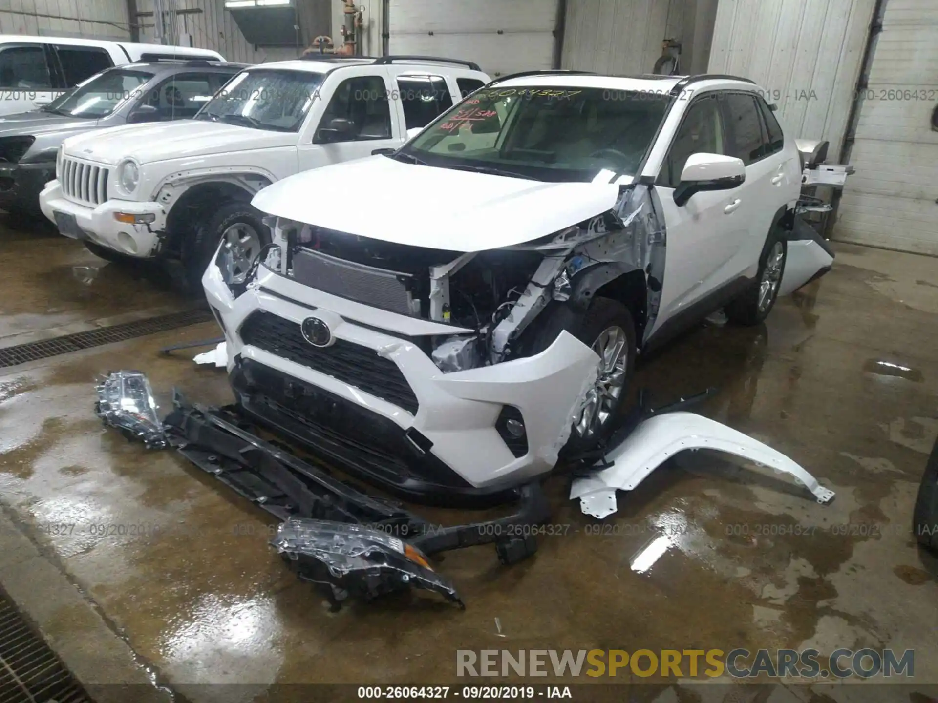 2 Photograph of a damaged car JTMA1RFV3KD026354 TOYOTA RAV4 2019